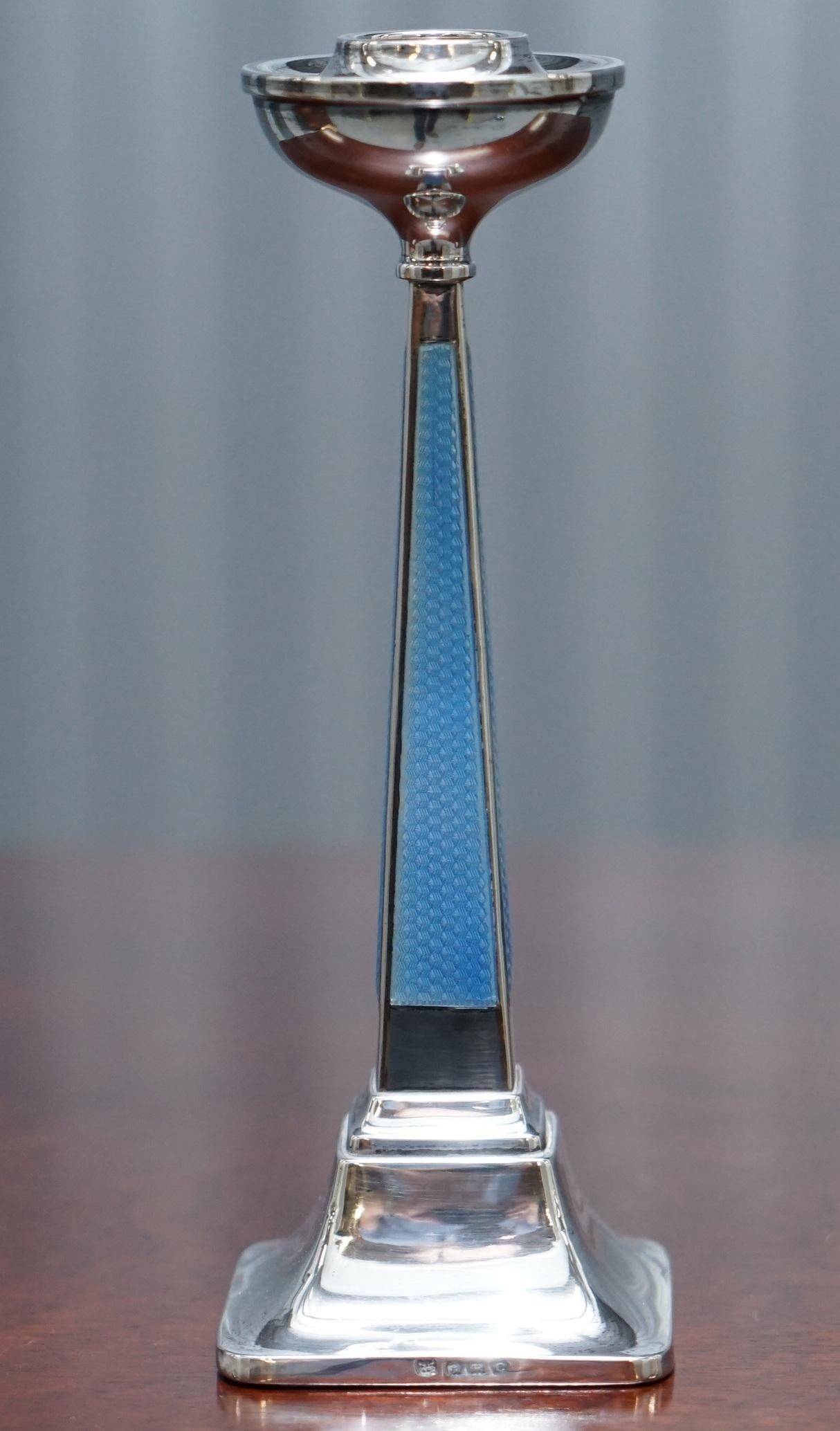 Pair of sterling silver and enamel candlesticks 1927 by Charles Green & Co.