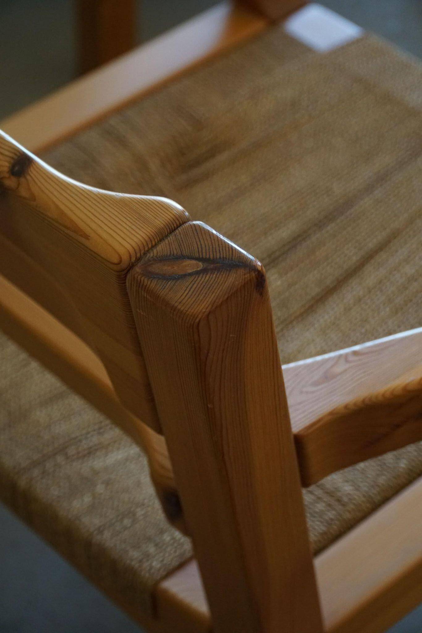 Tage Poulsen, a pair of brutalist chairs in pine and cord, Danish modern style, 1970s.