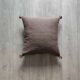 Moroccan brown cushion with cotton pompom