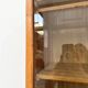 Bibliothèque-vitrine à portes coulissantes, chêne et verre fumé, années 60