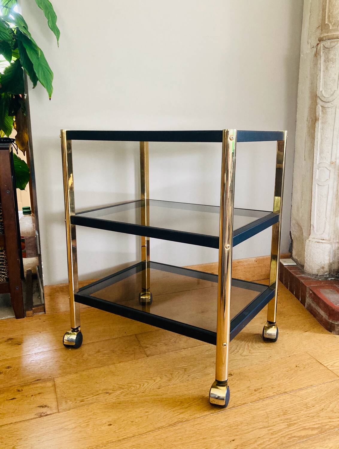 Side table in gold metal and smoked glasses 1970s