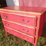 Matte gold and red patinated chest of drawers