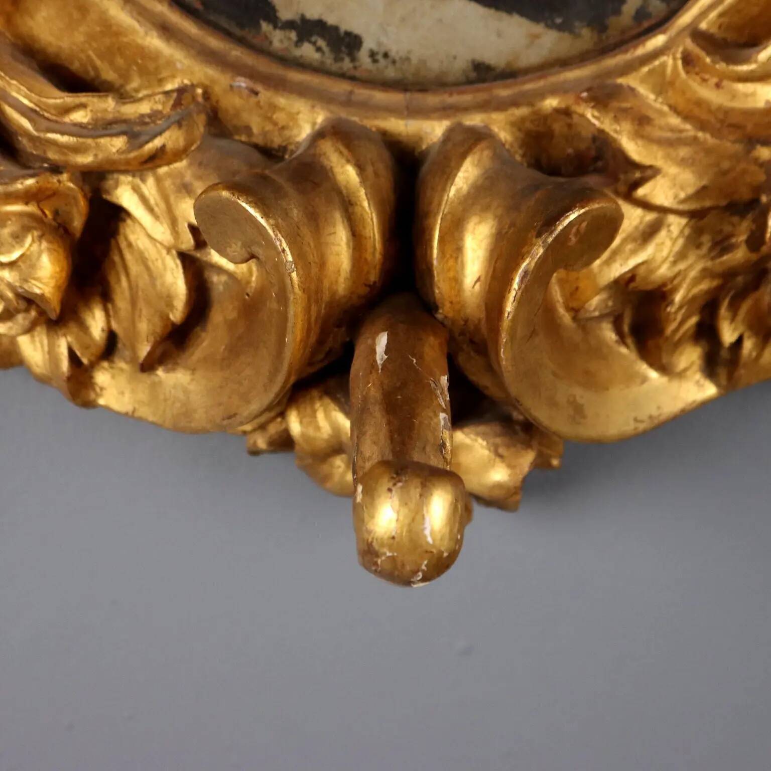 Baroque antique mirror carved in fir, Italy, 18th century.