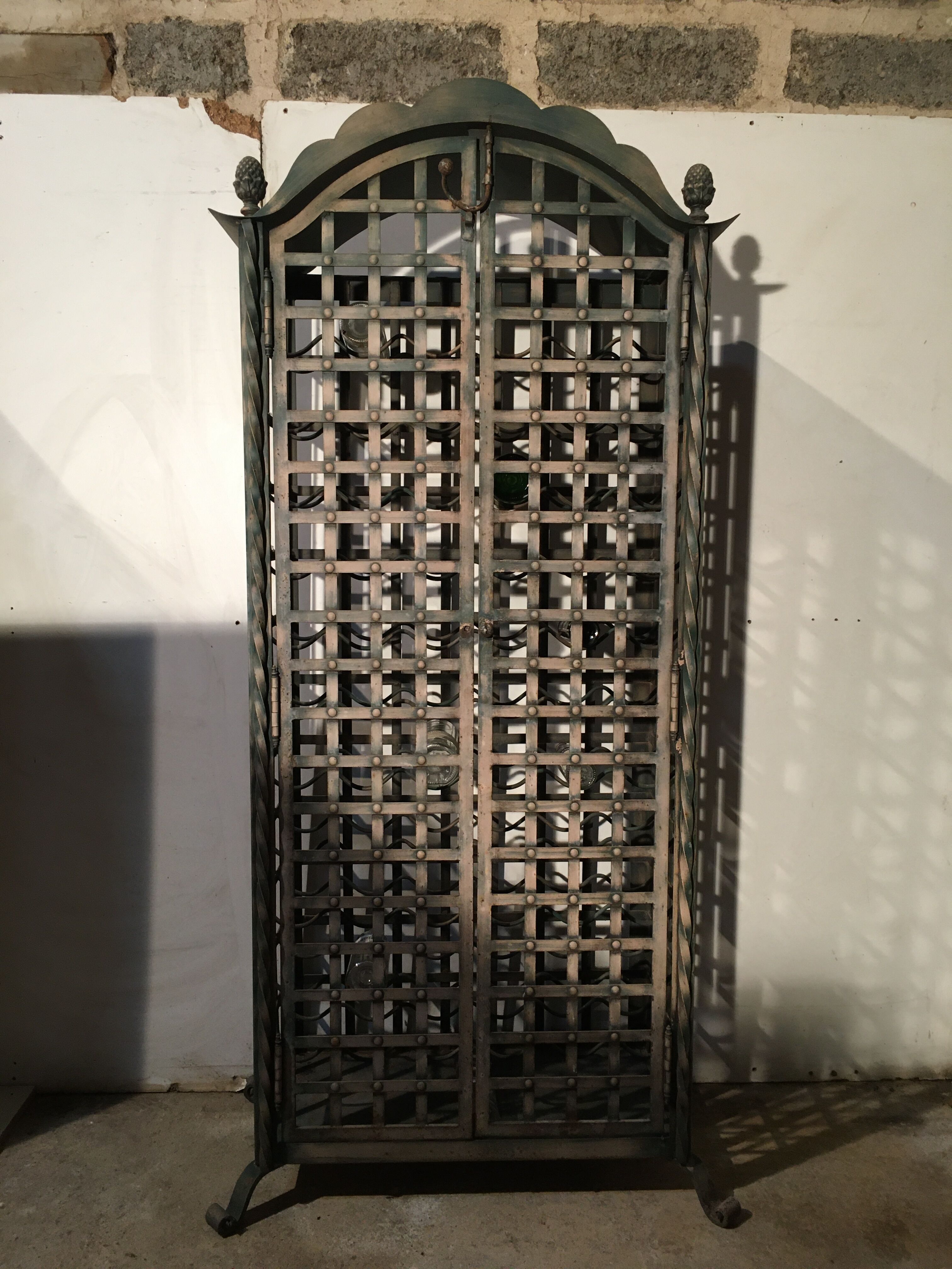 Wrought iron wine cabinet