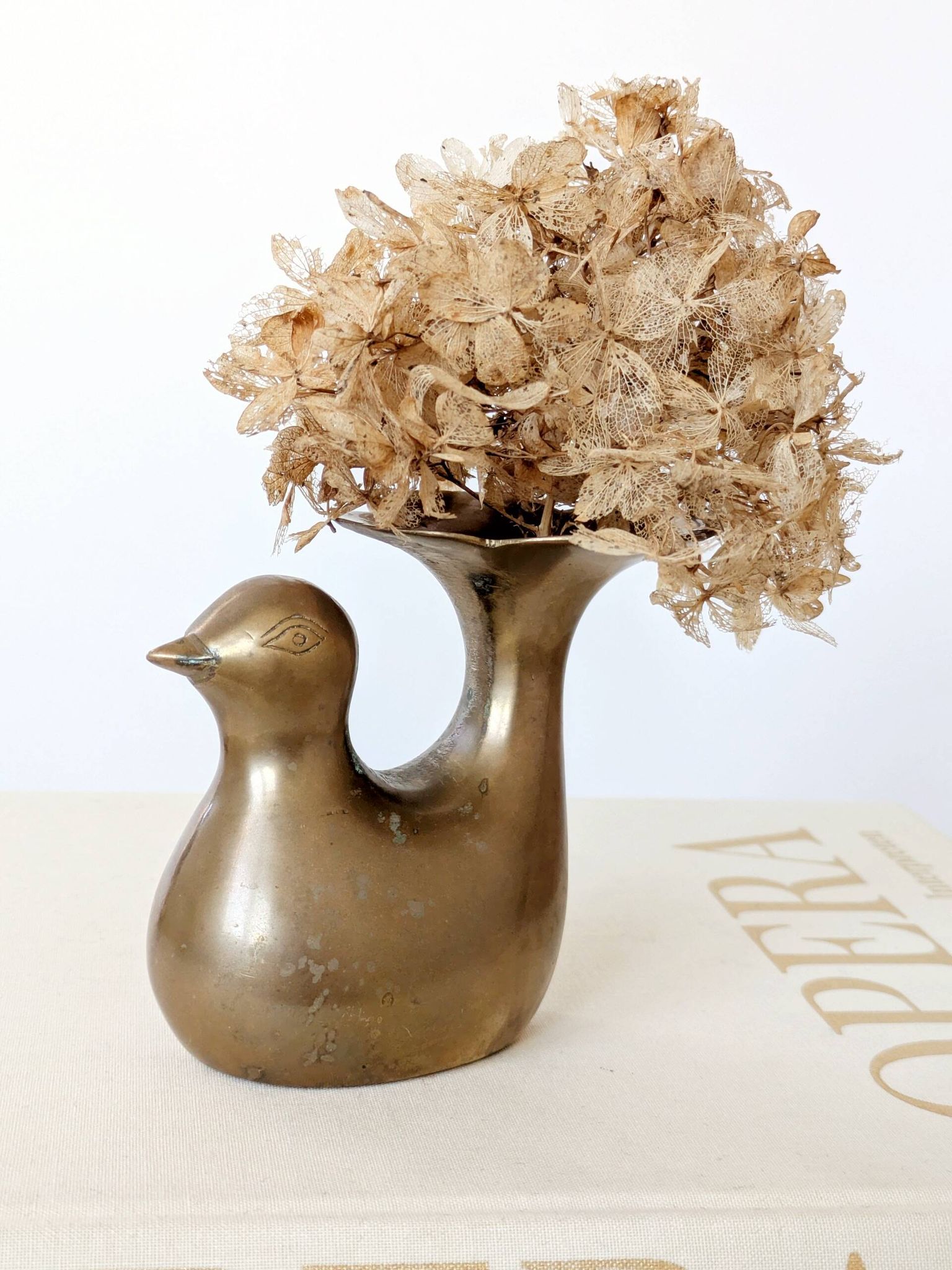 Candle holder or bird soliflore in brass, mid-century design from the 1960s.