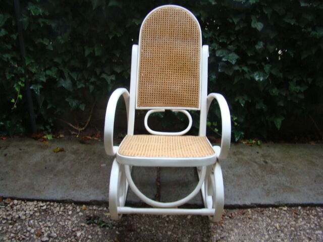Antique caned rocking chair