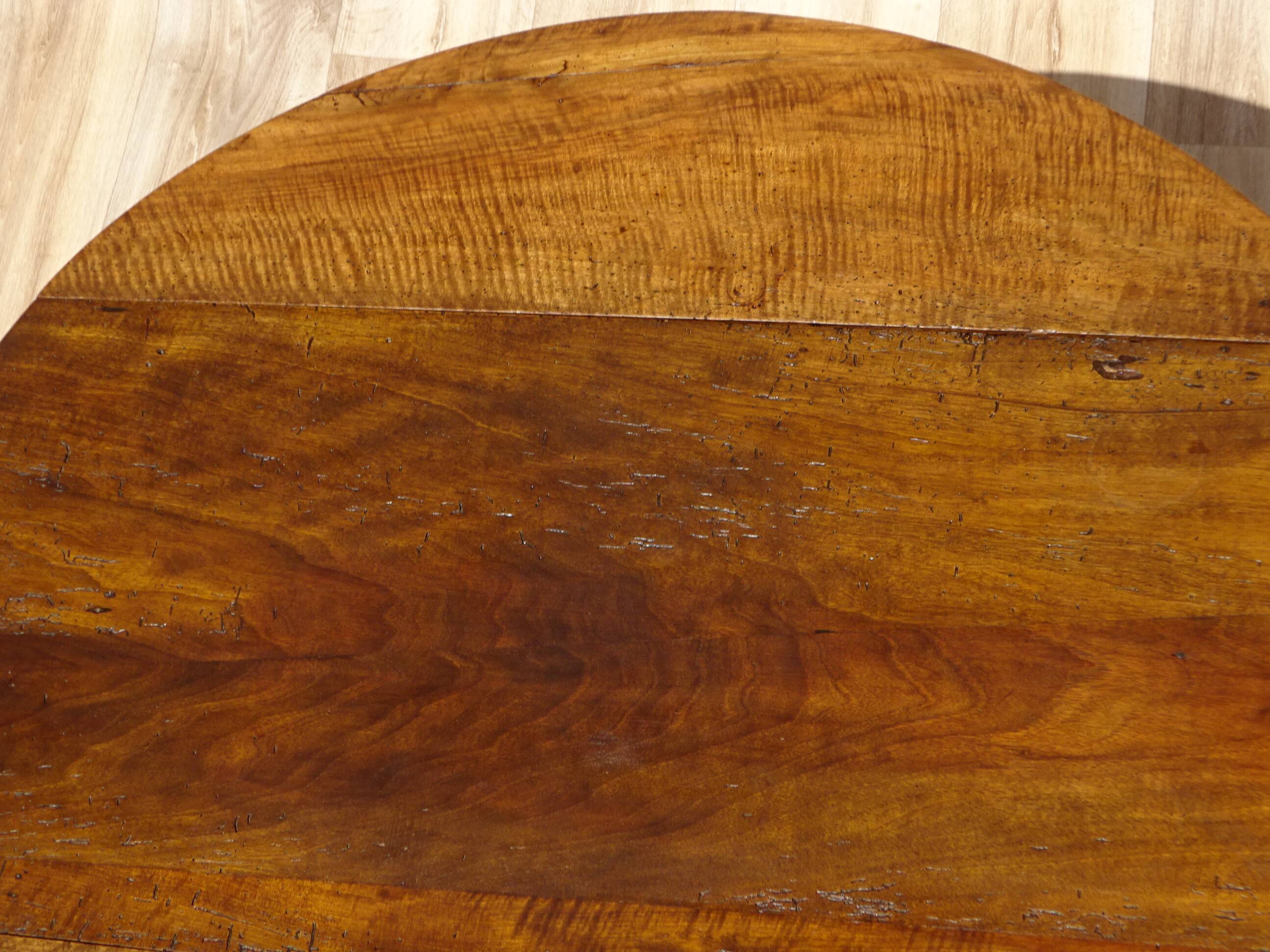 Antique walnut console table with honey spoon legs.