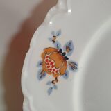 set of 4 dessert plates in white Limoges porcelain with flowers, the edge of one is different