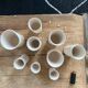 Lot of 9 craft porcelain vases