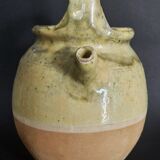 Cruche chevrette terre cuite vernissée à couverte jaune début XXème