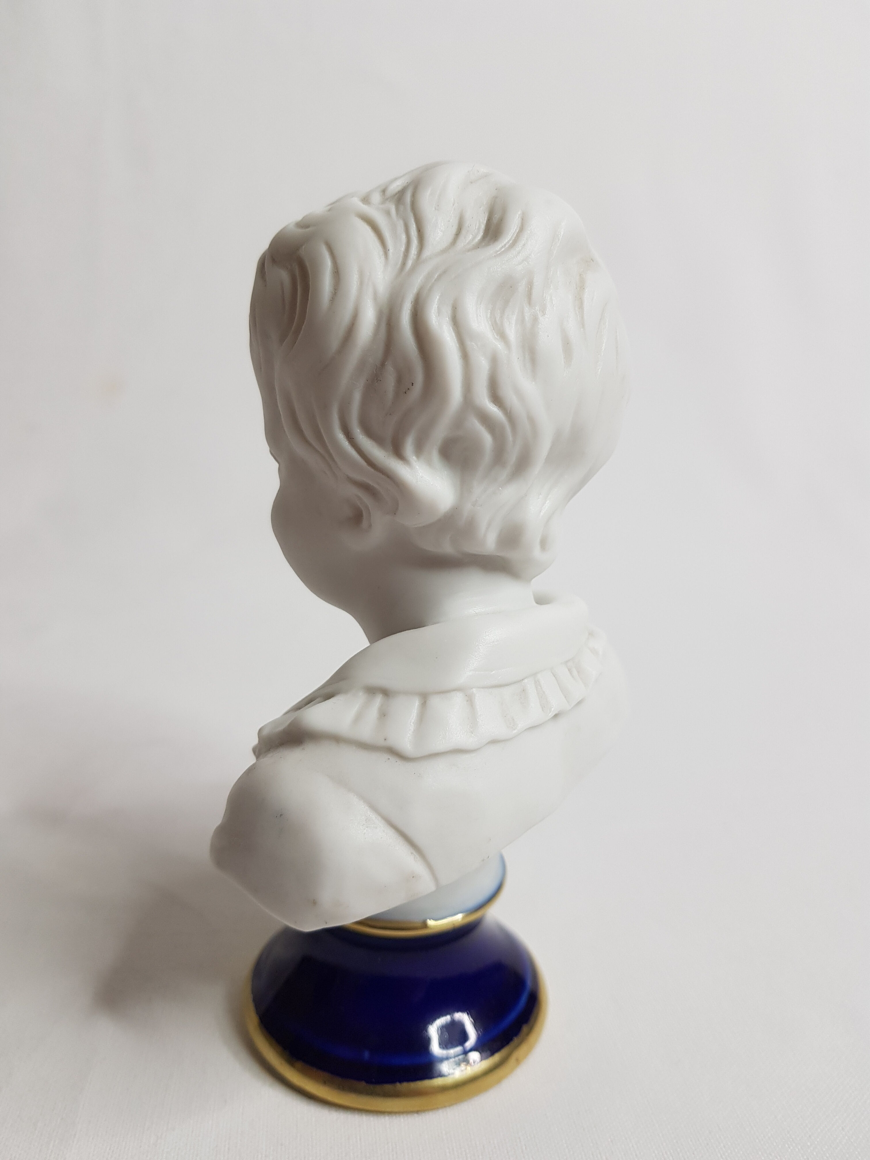 Porcelain biscuit busts, child, Alexandre Brongniart after Houdon