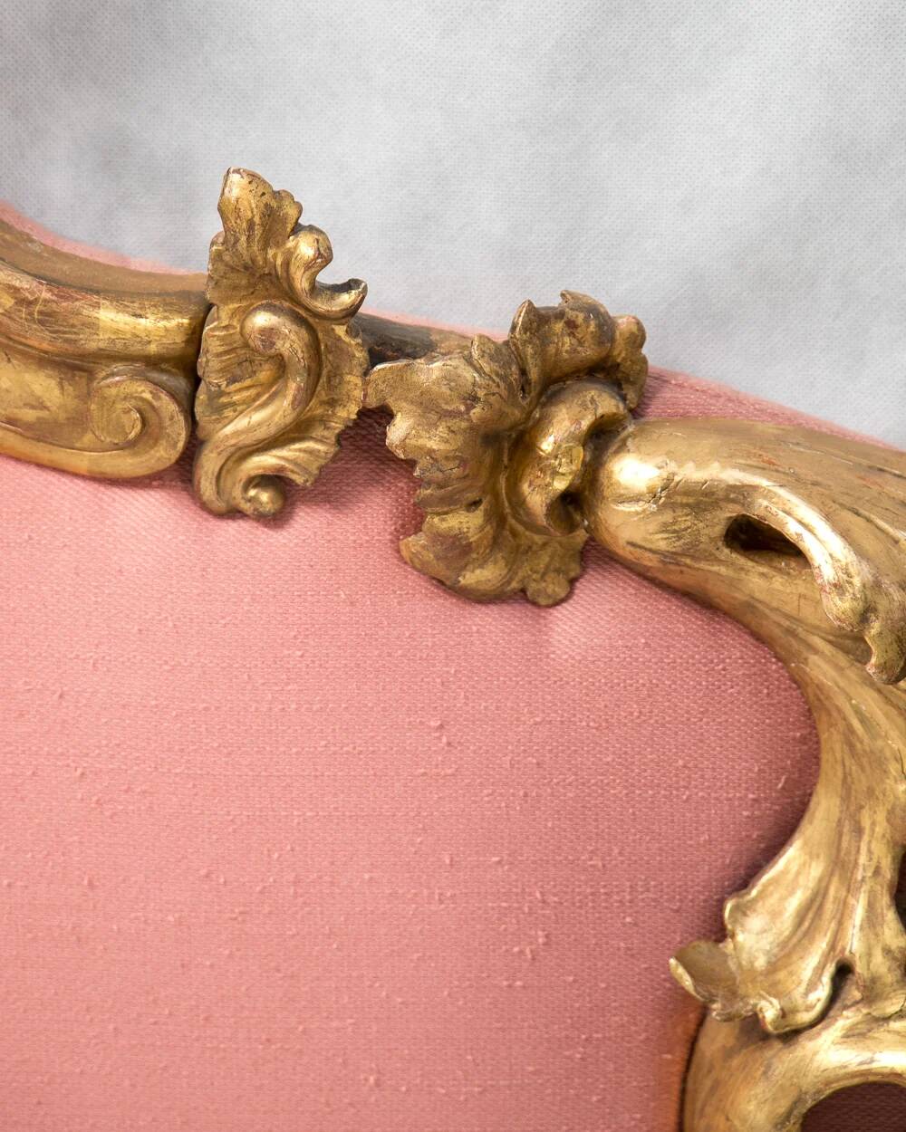 Italian rococo-style headboard in carved gilded wood, 19th century.