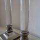Pair of lucite and silver-plated candlesticks