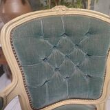 Fauteuil capitonné ancien