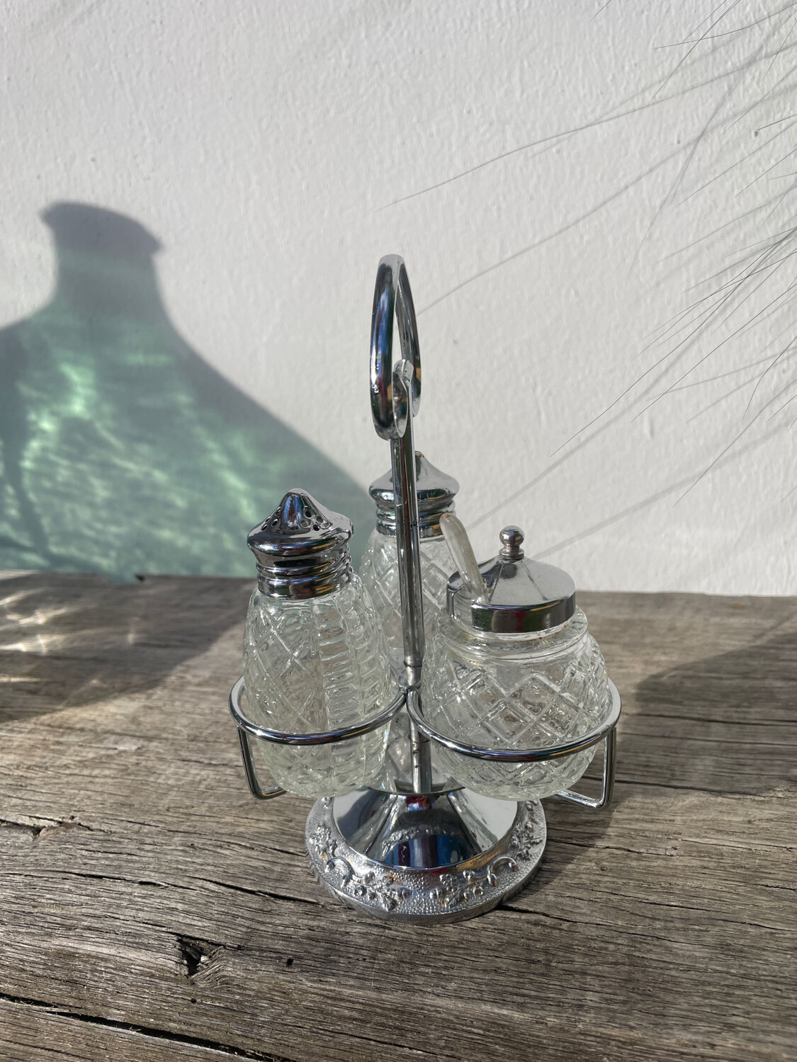 Silver-plated metal and glass salt and pepper shakers