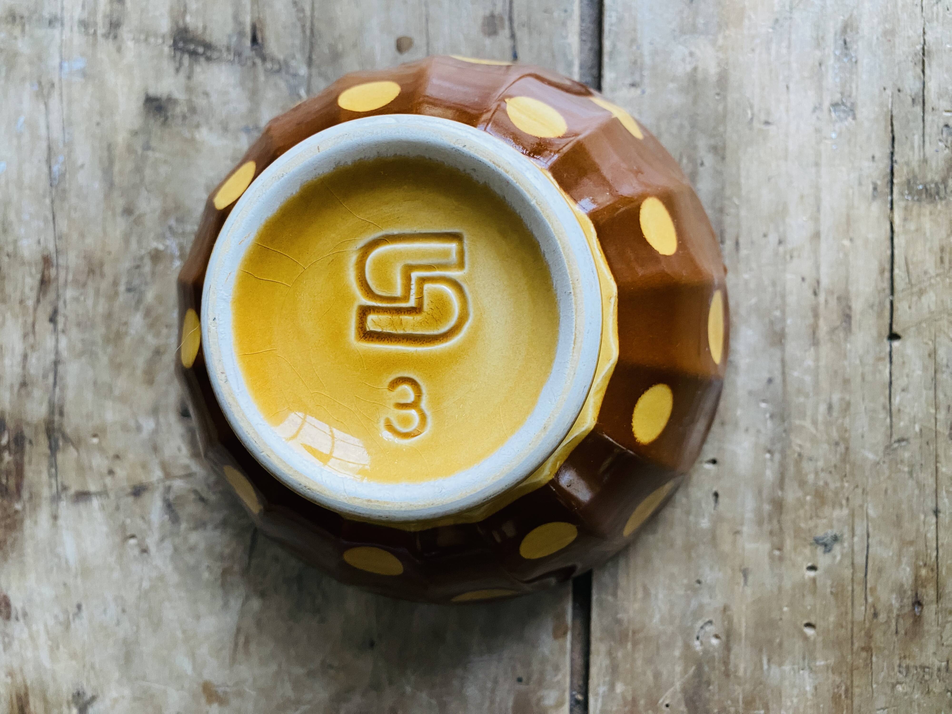 Old faceted bowl with polka dot pattern from the Sarreguemines earthenware factory