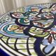 Polychrome decorative ceramic plate
