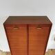 Cabinet curtain binder