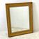 Wood and gilded stucco mirror in Louis XVI style
