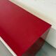 Glossy red semi-vintage lacquered IKEA sideboard with drawers