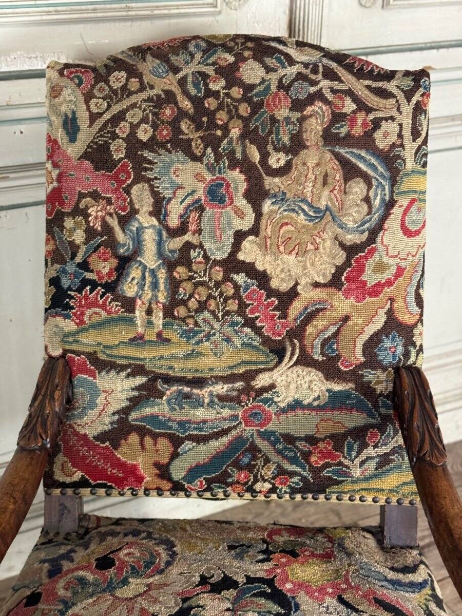 Carved walnut and tapestry armchair, late 17th century