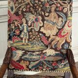 Carved walnut and tapestry armchair, late 17th century