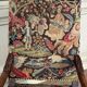 Carved walnut and tapestry armchair, late 17th century