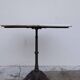 Bistro pedestal table in marble and cast iron lion paws