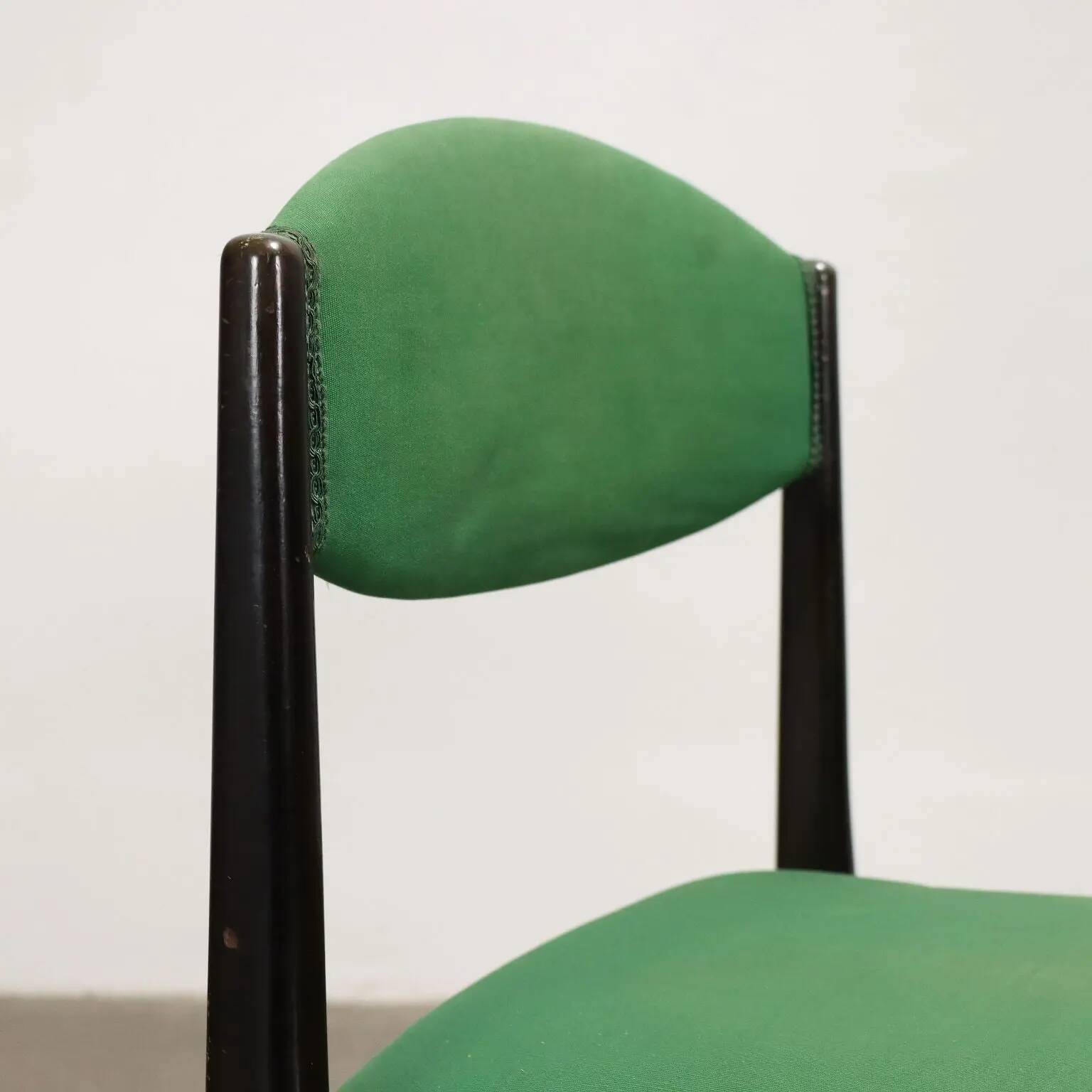 Vintage 1960s ebony wood chairs, foam padding, fabric.