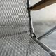 Set of two vintage folding chairs with an aluminium wire frame.