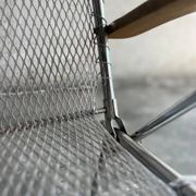 Set of two vintage folding chairs with an aluminium wire frame.