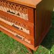 Rattan and wood splayed-leg chest of drawers