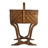 Worker on wooden feet