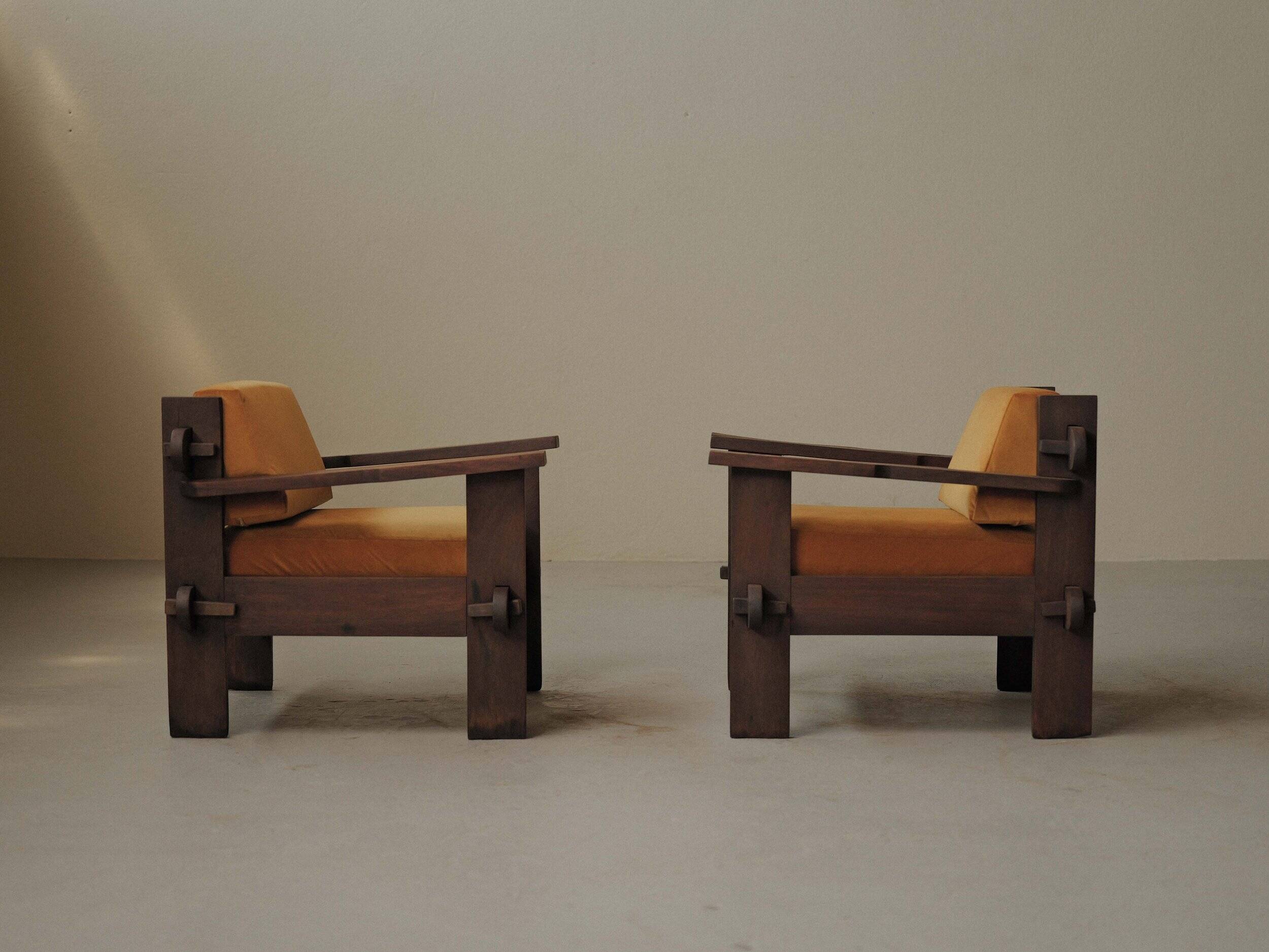 Pair of architect's armchairs in solid wood, France, circa 1970.