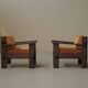Pair of architect's armchairs in solid wood, France, circa 1970.