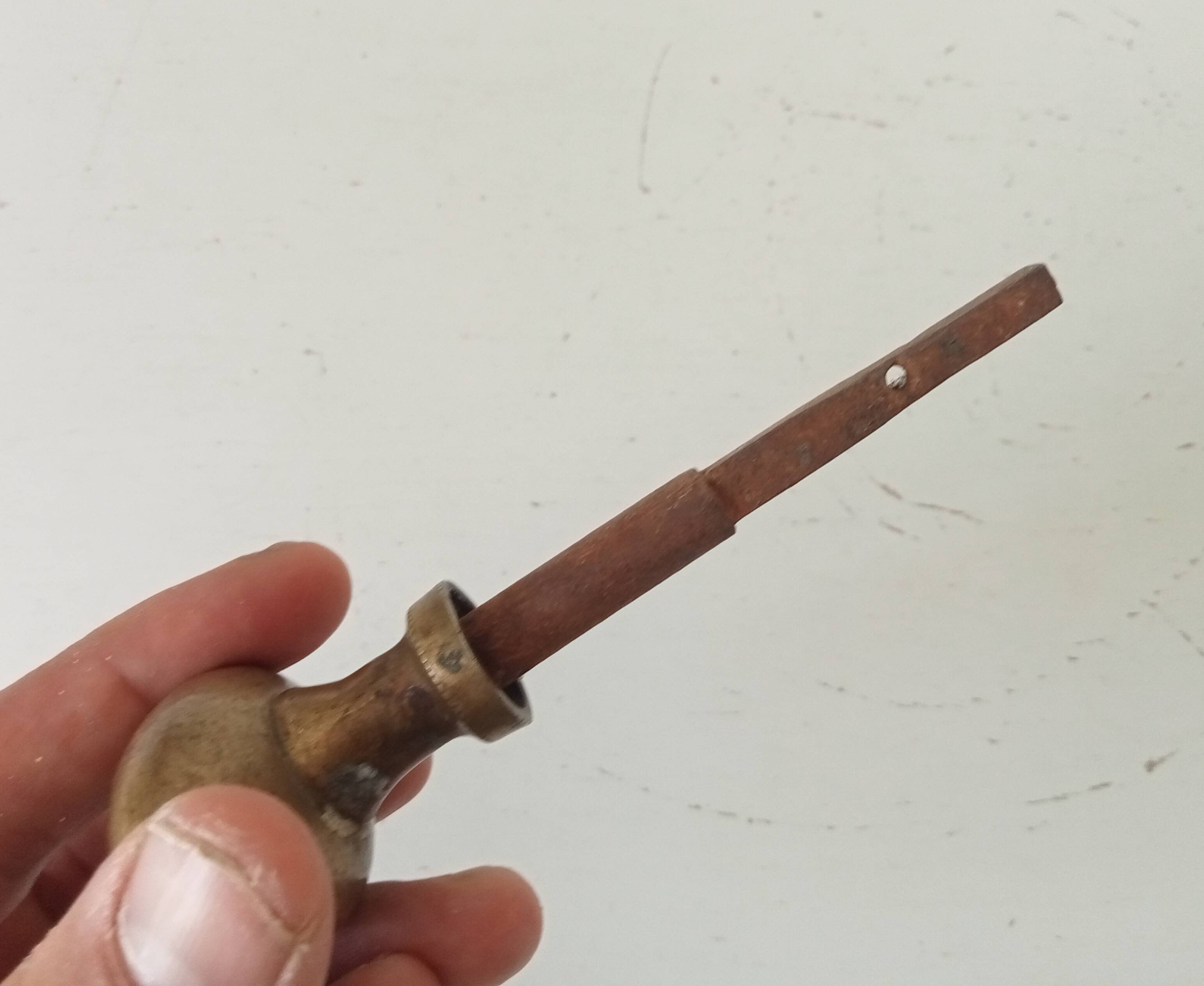 Antique olive door handle from the 19th century.
