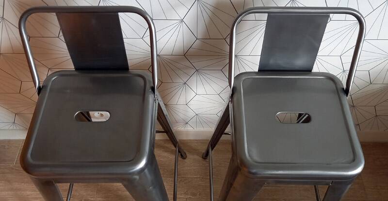 Pair of tolix hpd 75 stools – in varnished raw steel.