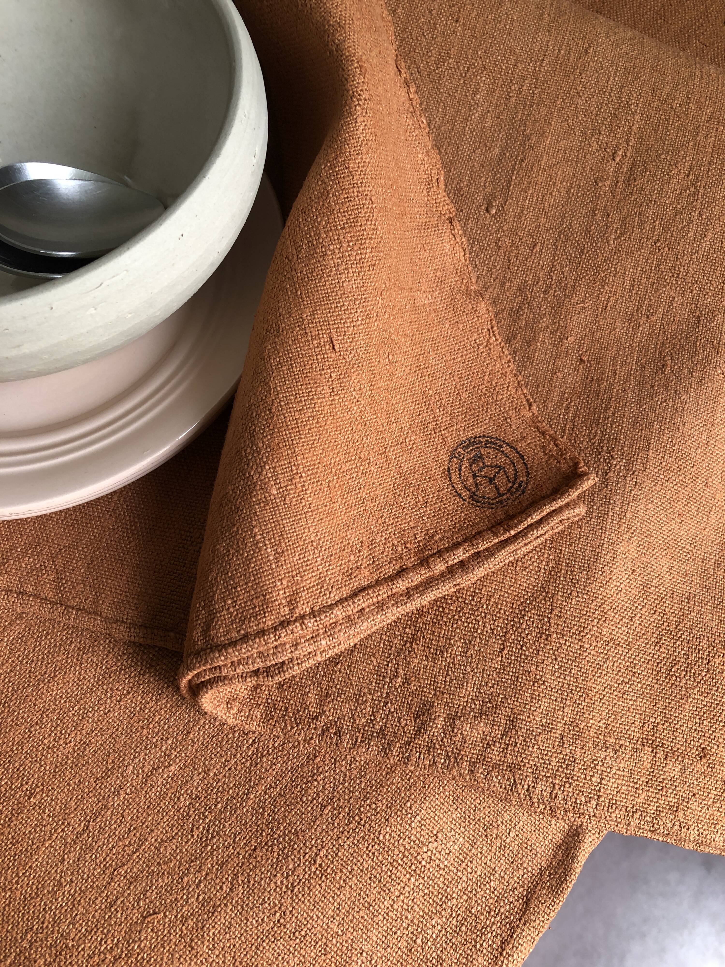 Old harvest tablecloth in terracotta tinted hemp
