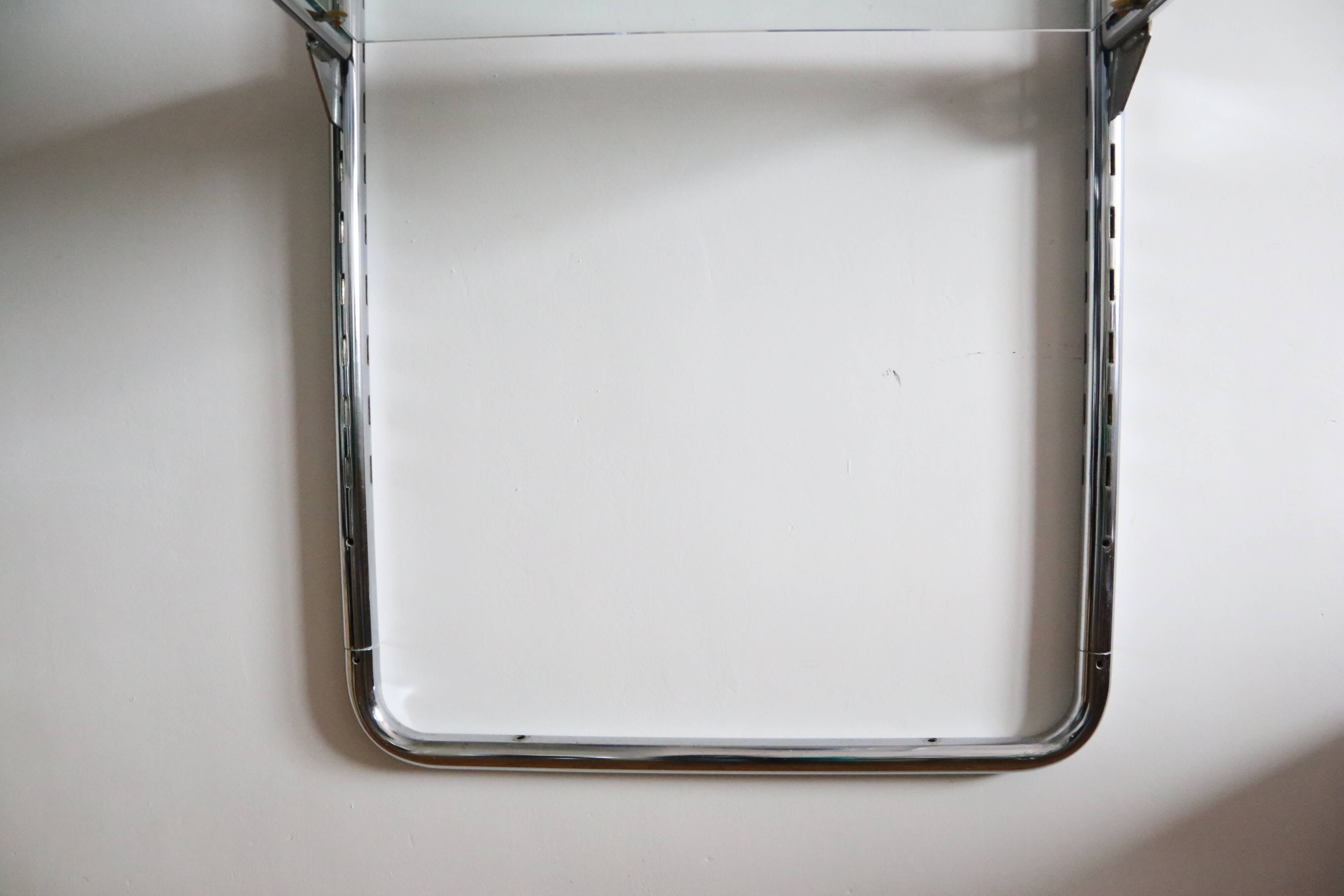Chrome and glass wall shelf, circa 1960