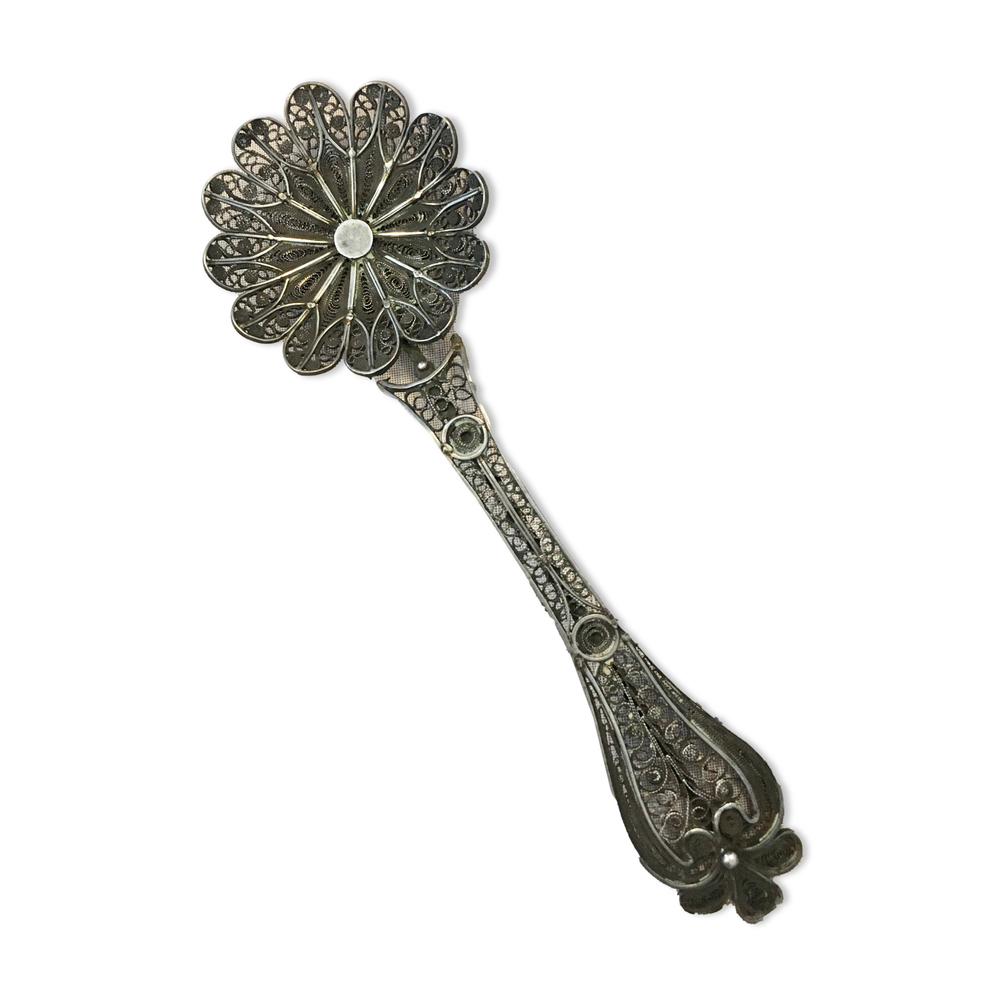 silver sprinkler spoon