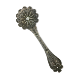 silver sprinkler spoon