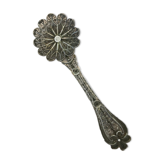 silver sprinkler spoon