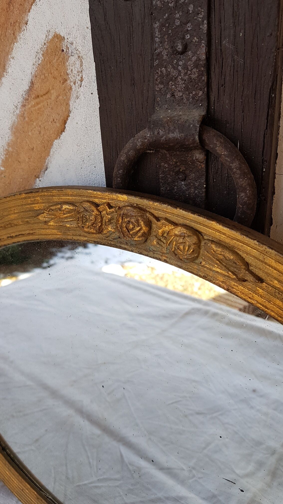 Art Deco golden oval mirror