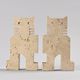 Pair of stylised cats in travertine, Fratelli Manelli, Italy, circa 1970.