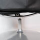 Easy chair with stool upholstered with black leather of Danish design, 1970s
