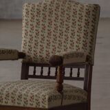 Fauteuil danois moderne en bois tourné avec tissu floral, début du XXe siècle