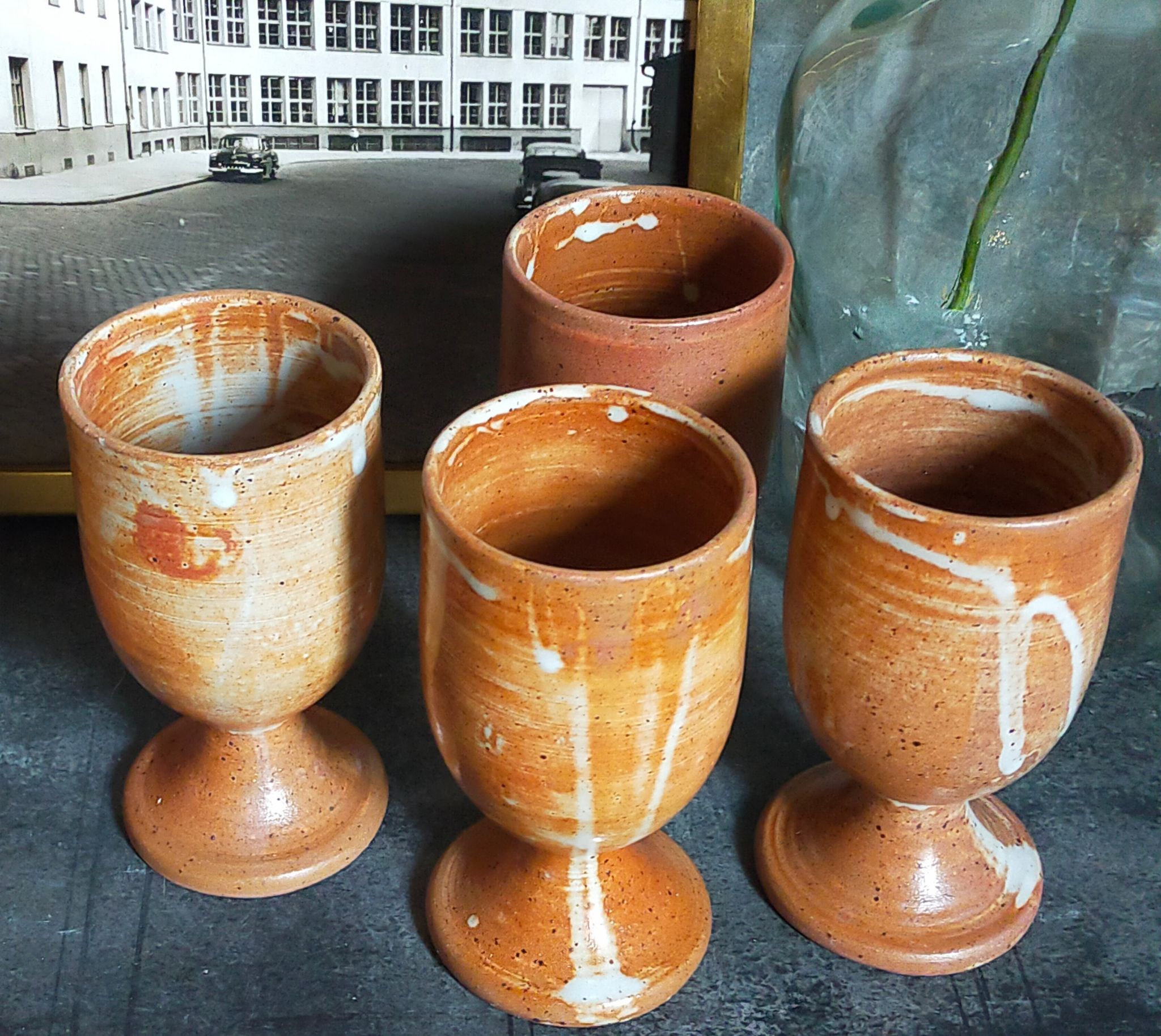 Four potter's mugs turned in vintage light stoneware