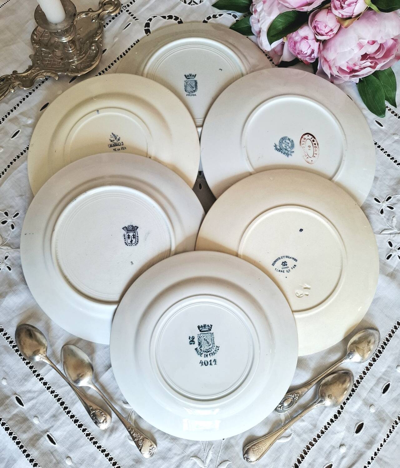 Antique earthenware dessert plates accompanied by a dish