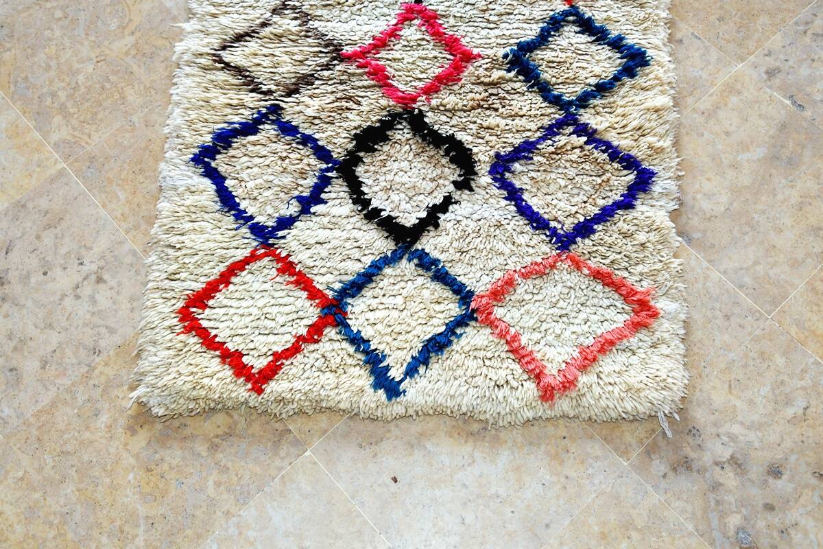 Small vintage beni ouarain rug