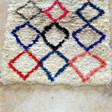 Small vintage beni ouarain rug